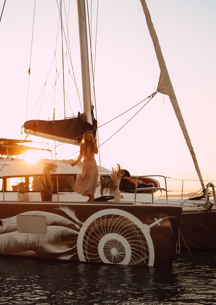 http://Woman%20standing%20onboard%20of%20Lagoon%20380%20S2